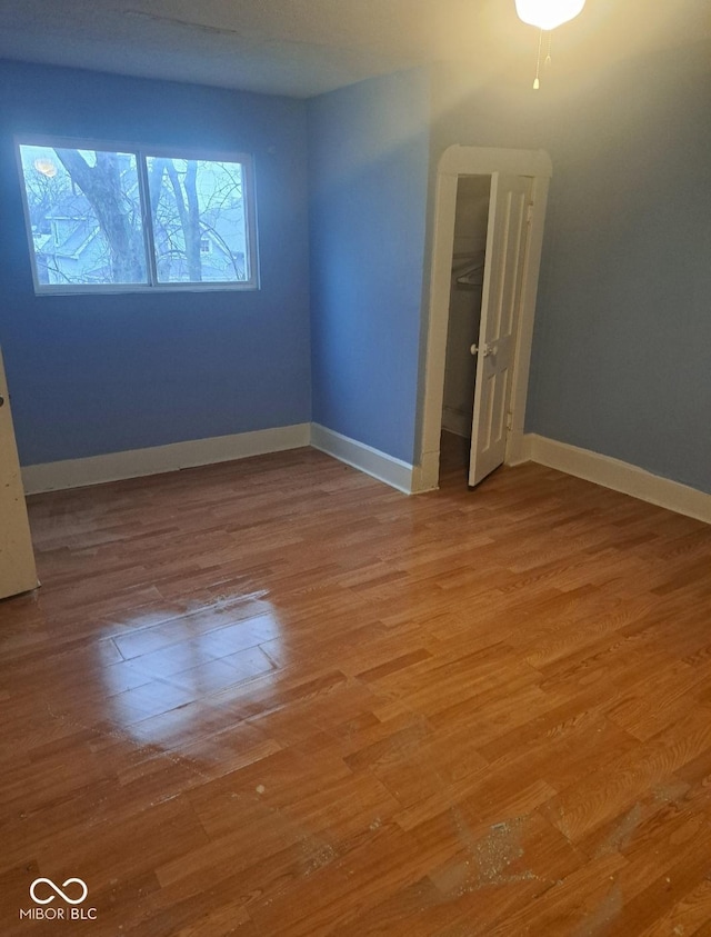 2249 E Brookside Ave, Indianapolis, IN 46218 - spare room with wood finished floors