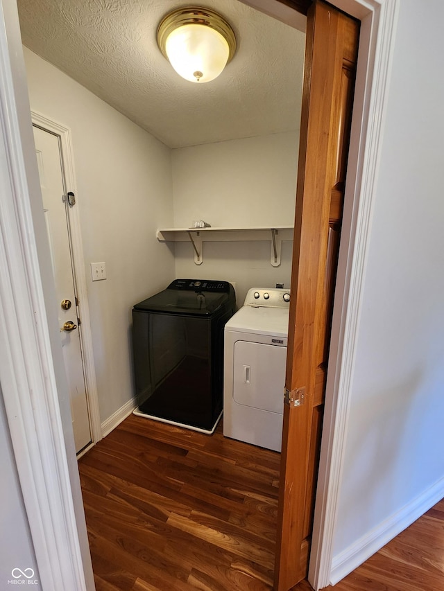 1633 Belfield St, Indianapolis, IN 46217 - washroom with washing machine and clothes dryer and dark wood-style floors