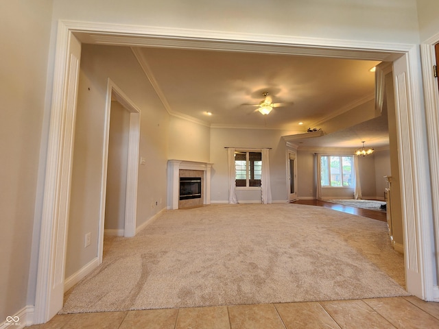 1633 Belfield St, Indianapolis, IN 46217 - unfurnished living room with ornamental molding, a glass covered fireplace, carpet floors, a chandelier, and ceiling fan