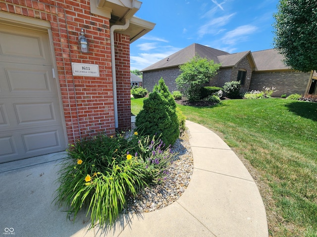 1633 Belfield St, Indianapolis, IN 46217 - property entrance featuring brick siding and a lawn