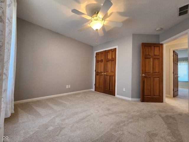 1633 Belfield St, Indianapolis, IN 46217 - unfurnished bedroom with carpet flooring, a closet, and ceiling fan