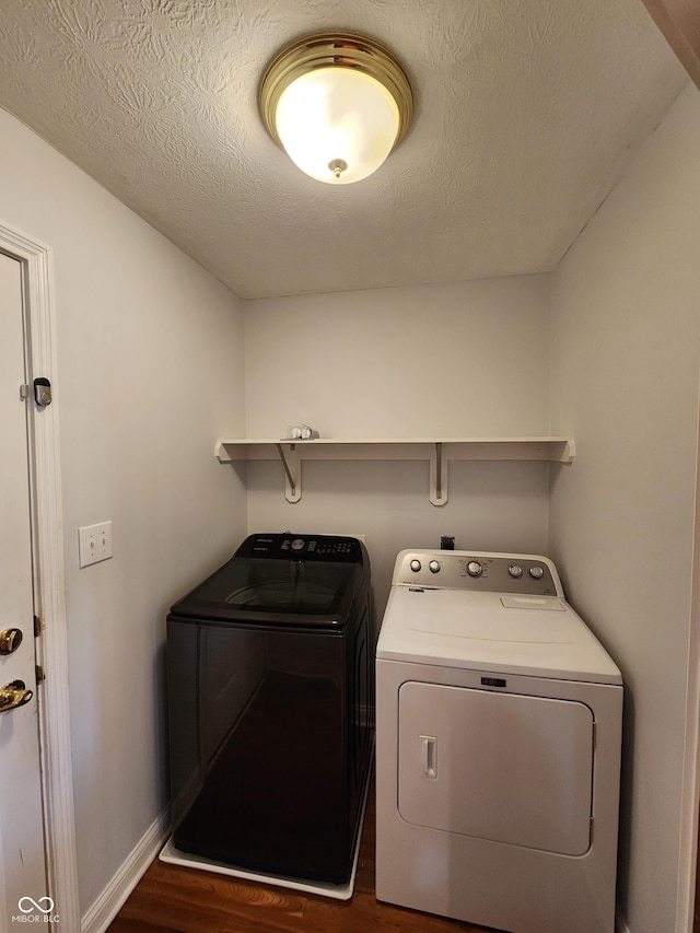 1633 Belfield St, Indianapolis, IN 46217 - washroom with separate washer and dryer and dark wood-type flooring
