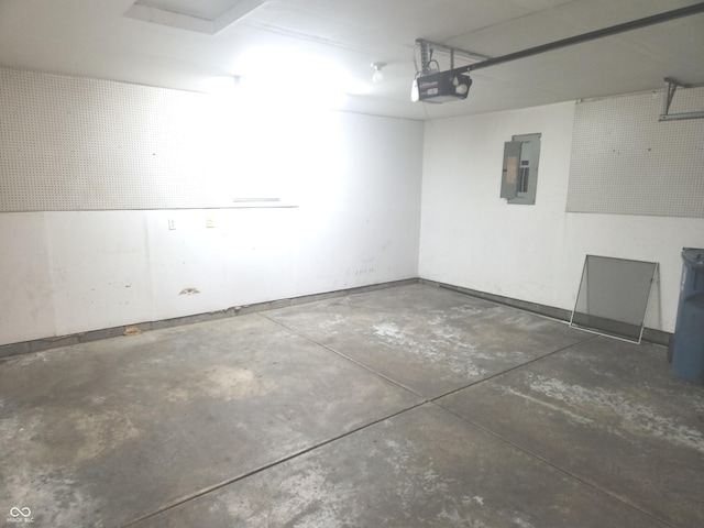 546 Grand Woods Dr, Indianapolis, IN 46224 - garage featuring electric panel and a garage door opener
