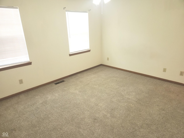 546 Grand Woods Dr, Indianapolis, IN 46224 - unfurnished room with light colored carpet and ceiling fan
