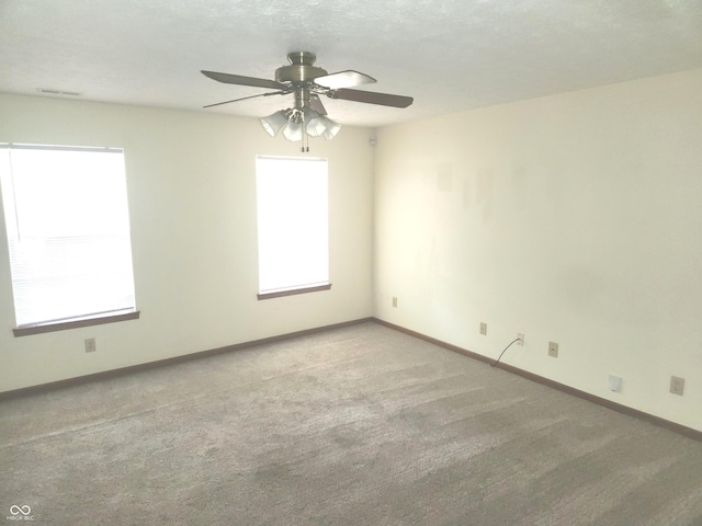 546 Grand Woods Dr, Indianapolis, IN 46224 - empty room with carpet, healthy amount of natural light, and a ceiling fan