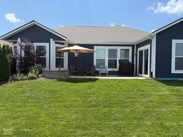 19280 Scofield Ridge Blvd, Westfield, IN 46062 - rear view of house with a lawn, a patio, and roof with shingles