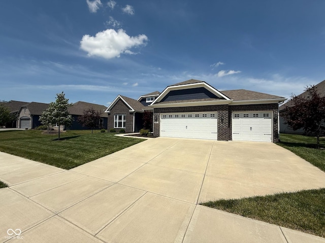 19280 Scofield Ridge Blvd, Westfield, IN 46062 - craftsman-style home with a front lawn, an attached garage, concrete driveway, and brick siding