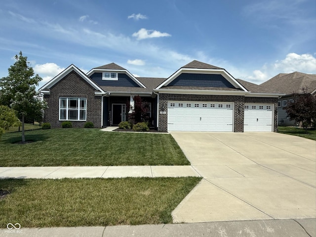 19280 Scofield Ridge Blvd, Westfield, IN 46062 - craftsman house featuring an attached garage, a front lawn, driveway, and brick siding