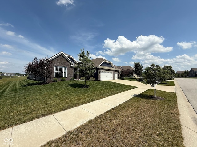 19280 Scofield Ridge Blvd, Westfield, IN 46062 - view of front of house with a front yard, driveway, an attached garage, and brick siding