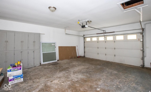 8650 Holliday Dr, Indianapolis, IN 46260 - garage featuring a garage door opener