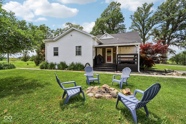 26735 Six Points Rd, Sheridan, IN 46069 - rear view of property featuring a yard and a fire pit