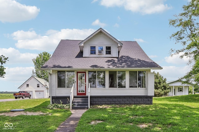 26735 Six Points Rd, Sheridan, IN 46069 - view of front of property featuring an outbuilding, a front lawn, roof with shingles, and a detached garage