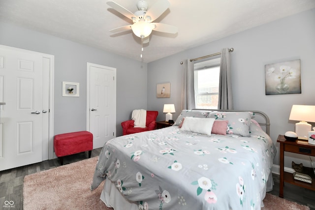 1336 N Butler Ave, Indianapolis, IN 46219 - bedroom with wood finished floors and a ceiling fan