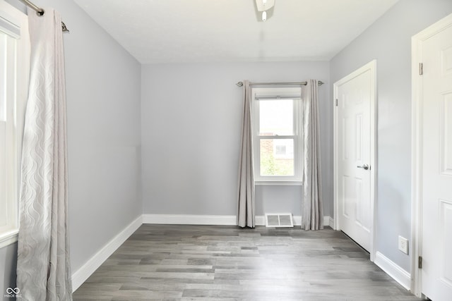 1336 N Butler Ave, Indianapolis, IN 46219 - unfurnished bedroom with wood finished floors
