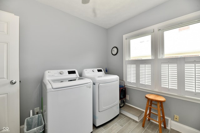 1336 N Butler Ave, Indianapolis, IN 46219 - laundry area featuring independent washer and dryer and baseboards