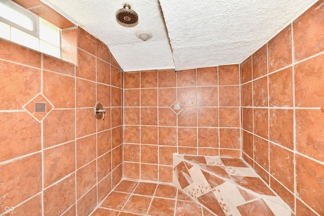 1336 N Butler Ave, Indianapolis, IN 46219 - full bathroom featuring a textured ceiling and tiled shower