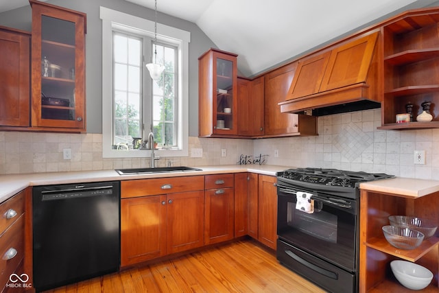 4224 River Rd, Columbus, IN 47203 - kitchen featuring black appliances, open shelves, custom range hood, brown cabinetry, and vaulted ceiling