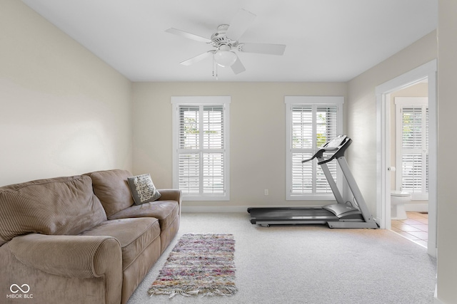 4224 River Rd, Columbus, IN 47203 - carpeted living area featuring healthy amount of natural light and ceiling fan