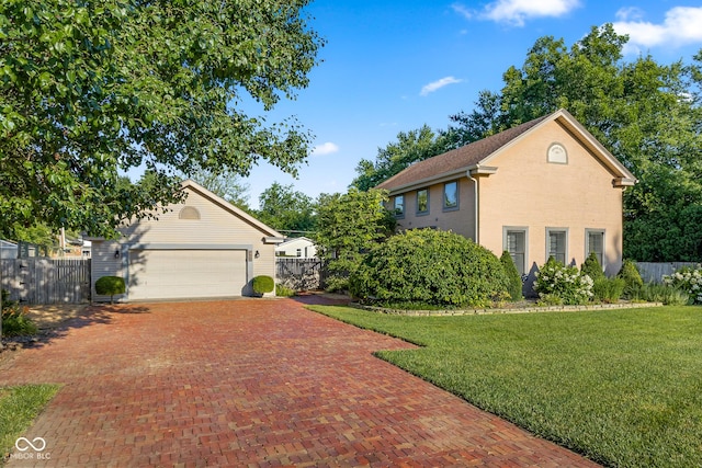 4224 River Rd, Columbus, IN 47203 - view of property exterior with decorative driveway and a garage