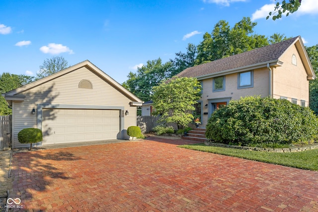4224 River Rd, Columbus, IN 47203 - view of front of home with decorative driveway and brick siding