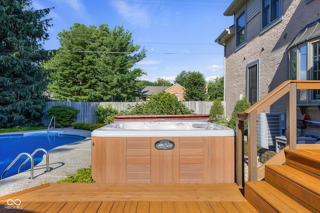 4224 River Rd, Columbus, IN 47203 - wooden terrace featuring a hot tub