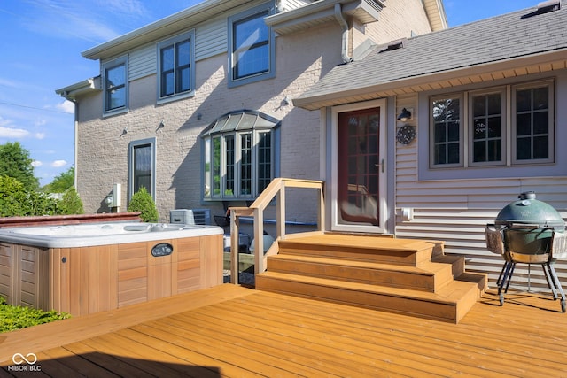 4224 River Rd, Columbus, IN 47203 - wooden deck with a hot tub and a grill