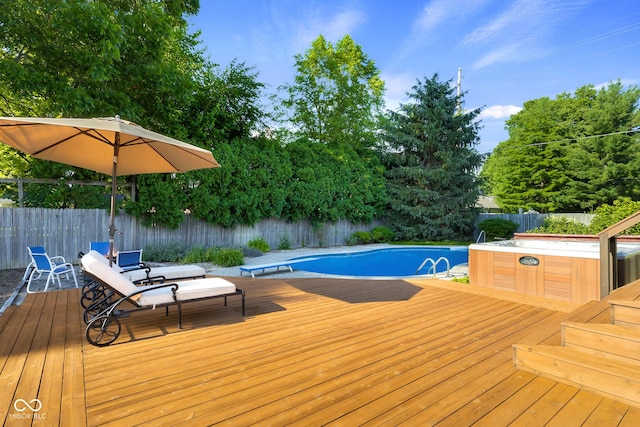 4224 River Rd, Columbus, IN 47203 - view of pool featuring a deck, a fenced backyard, and view of wooded area