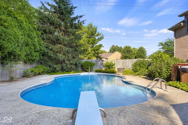 4224 River Rd, Columbus, IN 47203 - view of swimming pool with a fenced backyard, a patio area, and a diving board