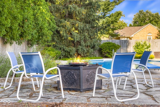 4224 River Rd, Columbus, IN 47203 - view of pool with a fire pit and a patio area