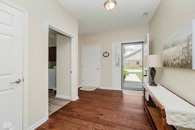 5651 Jones Dr, Plainfield, IN 46168 - entryway with wood finished floors and baseboards