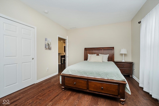 5651 Jones Dr, Plainfield, IN 46168 - bedroom with dark wood-style flooring and baseboards