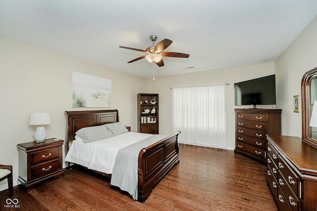 5651 Jones Dr, Plainfield, IN 46168 - bedroom featuring dark wood finished floors and ceiling fan