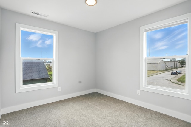 1905 Cornell Ave, Indianapolis, IN 46202 - carpeted spare room with healthy amount of natural light