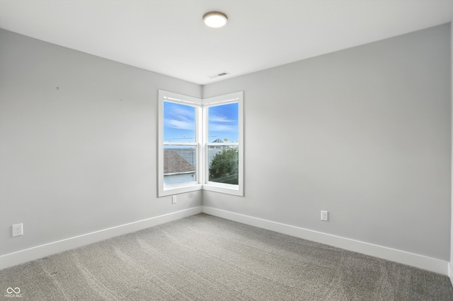 1905 Cornell Ave, Indianapolis, IN 46202 - spare room with light carpet and baseboards