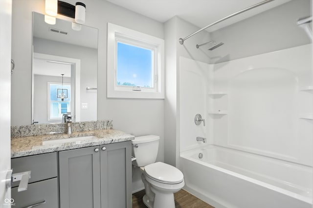 1905 Cornell Ave, Indianapolis, IN 46202 - full bathroom with vanity, wood finished floors, and bathtub / shower combination