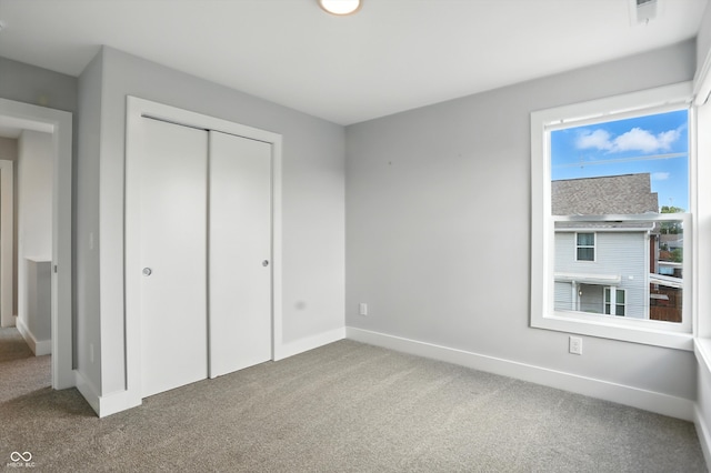 1905 Cornell Ave, Indianapolis, IN 46202 - unfurnished bedroom with carpet floors and a closet
