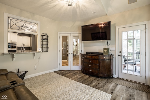295 Watershed Ct, Noblesville, IN 46062 - living room with french doors and dark wood finished floors