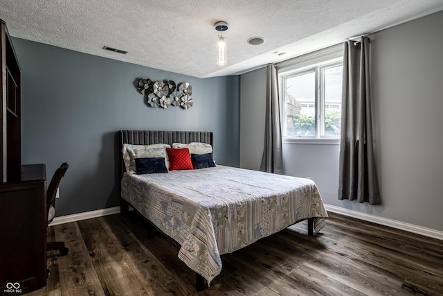 295 Watershed Ct, Noblesville, IN 46062 - bedroom featuring a textured ceiling and dark wood-style flooring