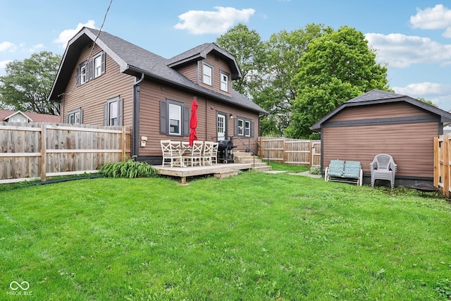 514 E 2nd St, Sheridan, IN 46069 - back of property with a wooden deck, a fenced backyard, and roof with shingles
