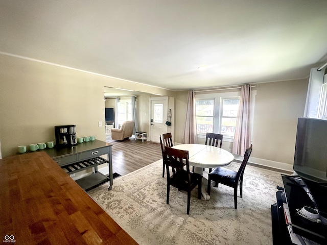 514 E 2nd St, Sheridan, IN 46069 - dining area featuring wood finished floors and baseboards