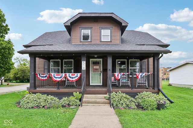 514 E 2nd St, Sheridan, IN 46069 - view of front facade with a shingled roof, covered porch, and a front yard
