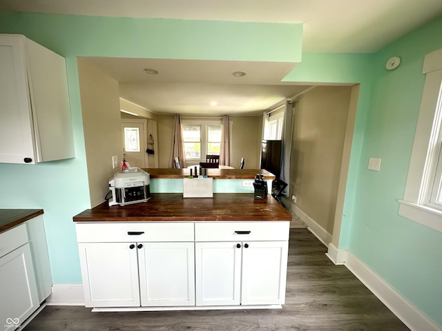 514 E 2nd St, Sheridan, IN 46069 - kitchen with wood counters, white cabinetry, dark wood-style floors, and recessed lighting