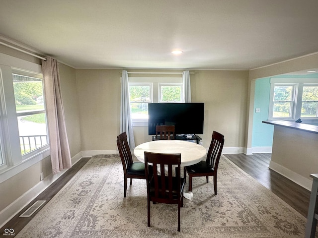 514 E 2nd St, Sheridan, IN 46069 - dining area with dark wood-type flooring and healthy amount of natural light