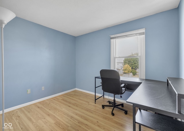 8642 Ray Cir, Indianapolis, IN 46256 - home office featuring wood finished floors and baseboards