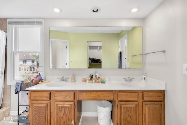 8642 Ray Cir, Indianapolis, IN 46256 - full bath featuring double vanity, a shower with curtain, and tile patterned flooring