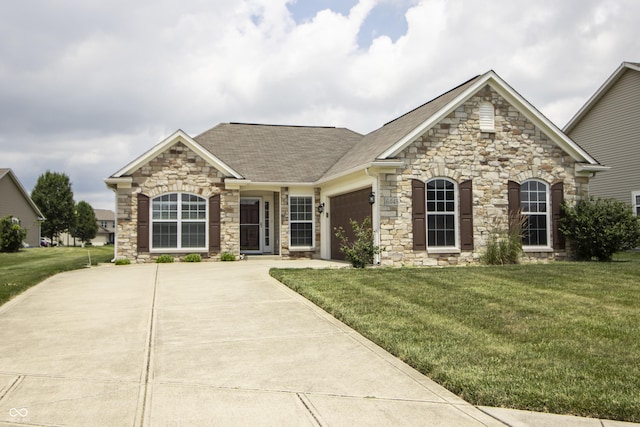 6448 W Whiteside Ct, Greenfield, IN 46140 - view of front of house featuring stone siding, a garage, and a front yard