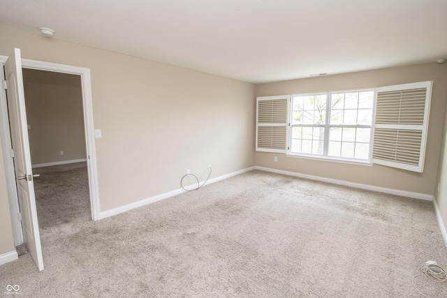 6448 W Whiteside Ct, Greenfield, IN 46140 - spare room with carpet flooring and baseboards