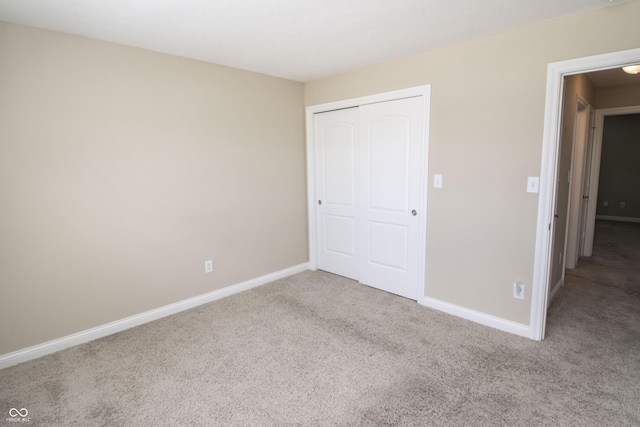 6448 W Whiteside Ct, Greenfield, IN 46140 - unfurnished bedroom with carpet and a closet