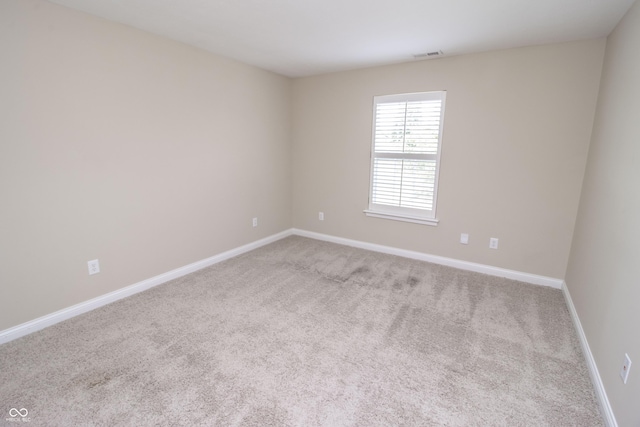 6448 W Whiteside Ct, Greenfield, IN 46140 - carpeted spare room featuring baseboards