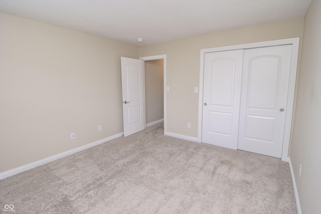 6448 W Whiteside Ct, Greenfield, IN 46140 - unfurnished bedroom featuring carpet and a closet